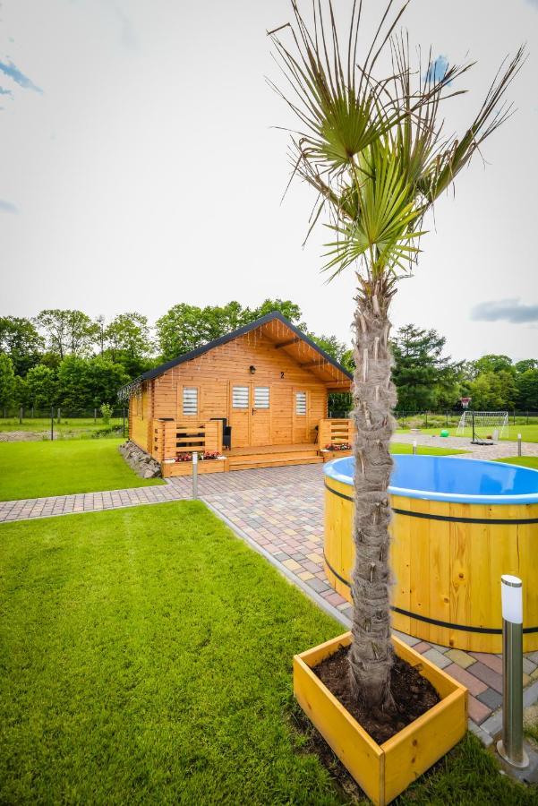 Nocleg Zator Domki Paradise Pod Palmami Exterior photo